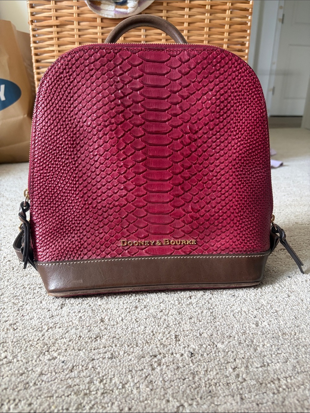Dooney & Bourke Burgundy Snake-Embossed Backpack with Brown Trim